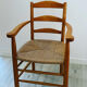 Wooden and straw armchair