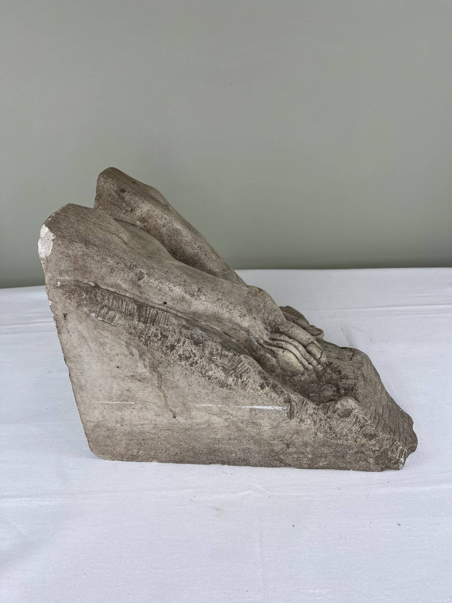 Stone sculpture, two feet on a block, signed D. Paillot.
