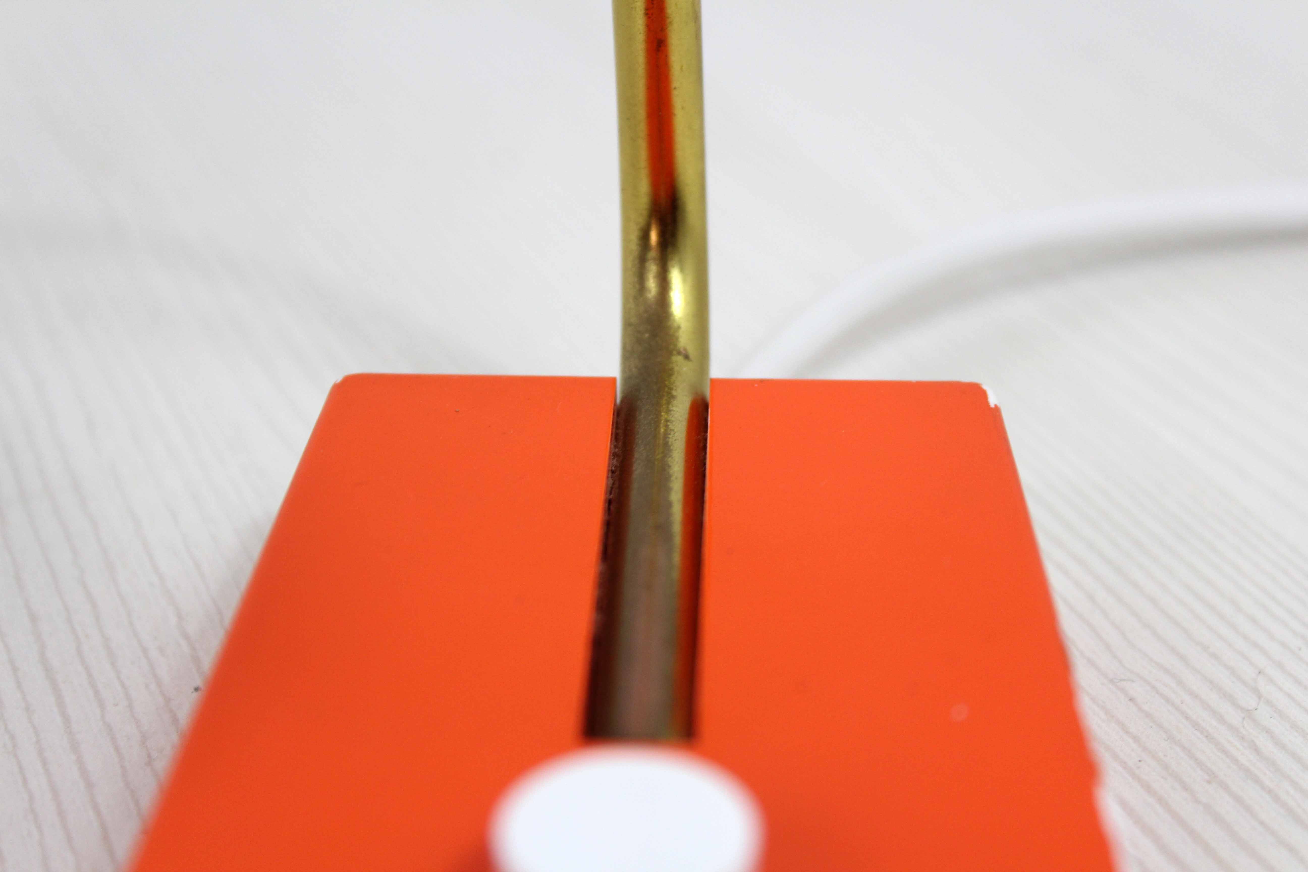 Vintage lamp in orange metal