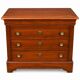 Louis Philippe chest of drawers with 4 drawers and brass.