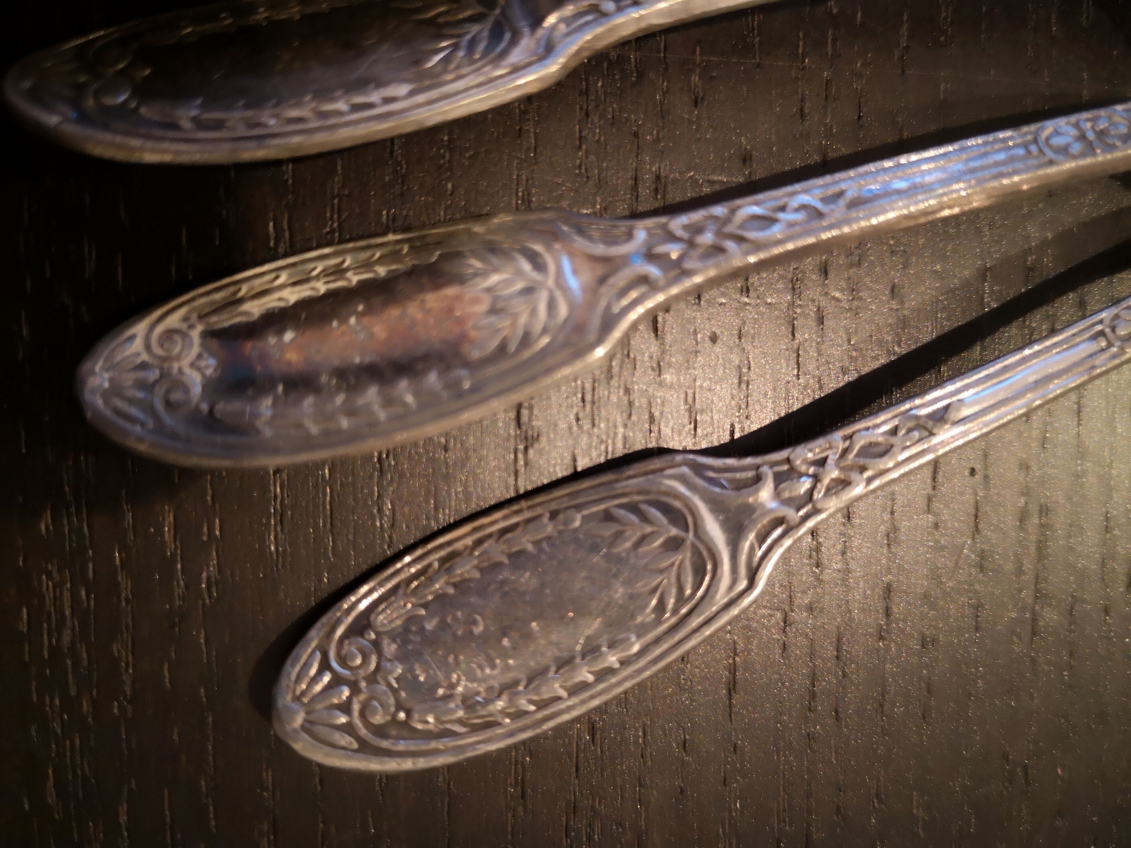 10 small silver metal spoons