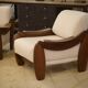 Brutalist pair of armchairs in mahogany and cream boucle 1970s.