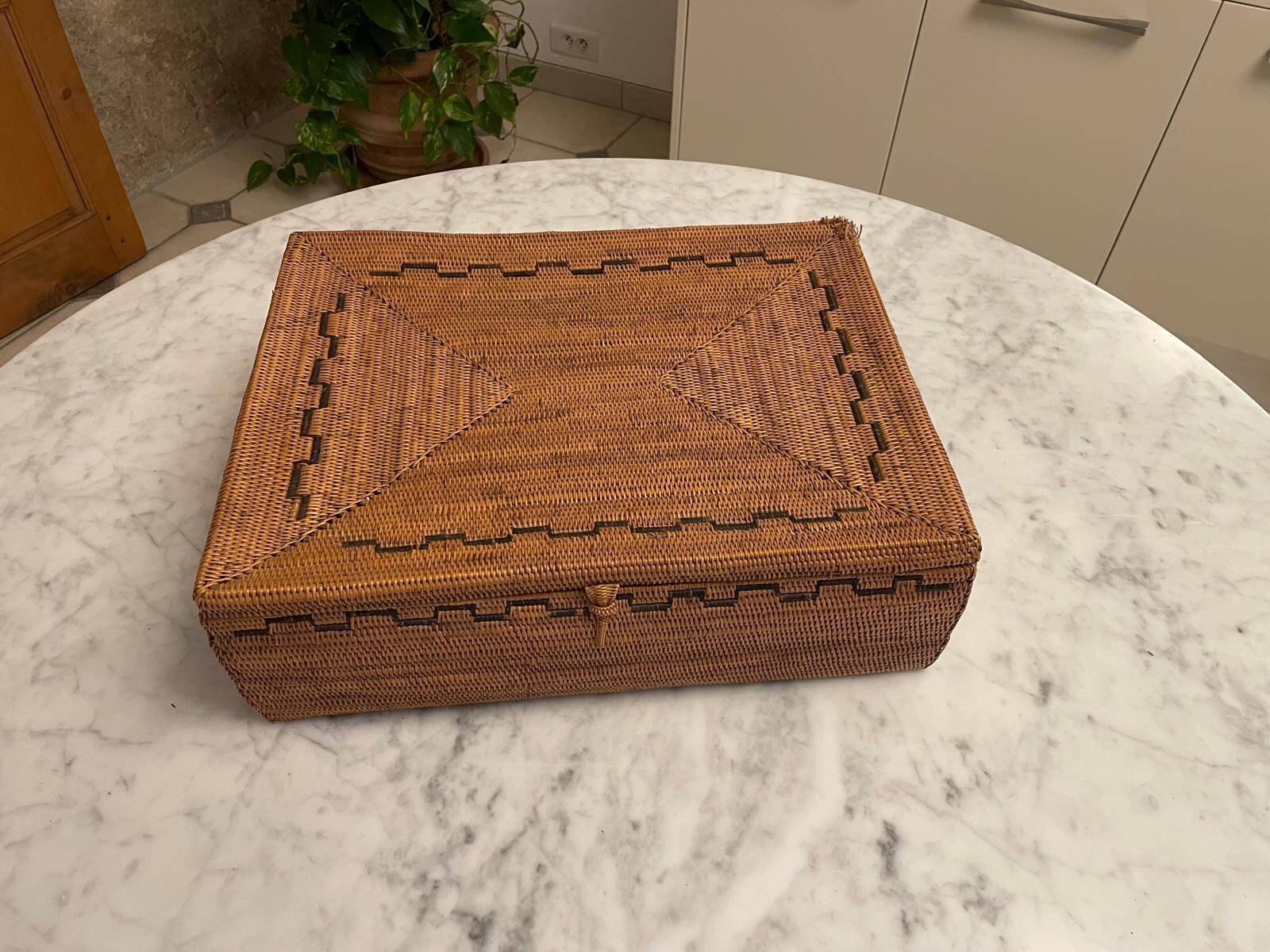 Vintage rattan trunk with lid