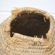 Old basket, burgundy straw and bramble, woven basket, interior decoration, pantry, flowerpot