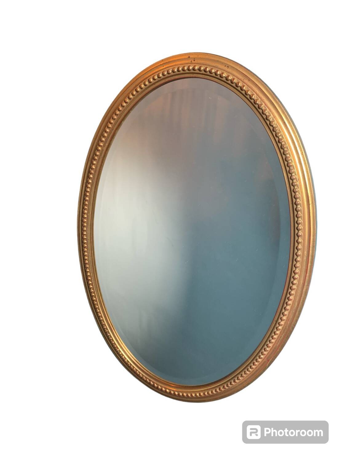 Vintage beveled gold oval mirror