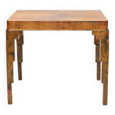 Sculptural table veneered in walnut, presumably Germany
