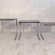 Set of 3 vintage nesting tables in chrome and smoked glass, Roche Bobois style.
