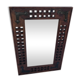 Miroir en tech ancien sculpté