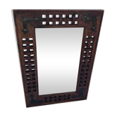 Mirror in ancient sculpted tech