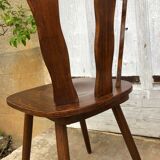 4 wooden chairs with brutalist design