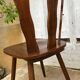 4 brutalist-style wooden chairs