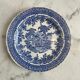 Set of four flat plates from English earthenware.