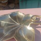 Gilded brass leaf pocket emptier