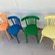 4 multi-colored bistro chairs