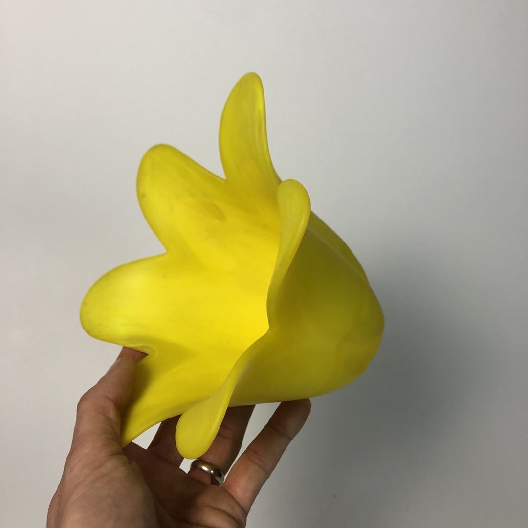 Small vase made of yellow glass paste, tulip shape blooms