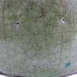 Bowl or empty pocket in cracked green sandstone varnish raku