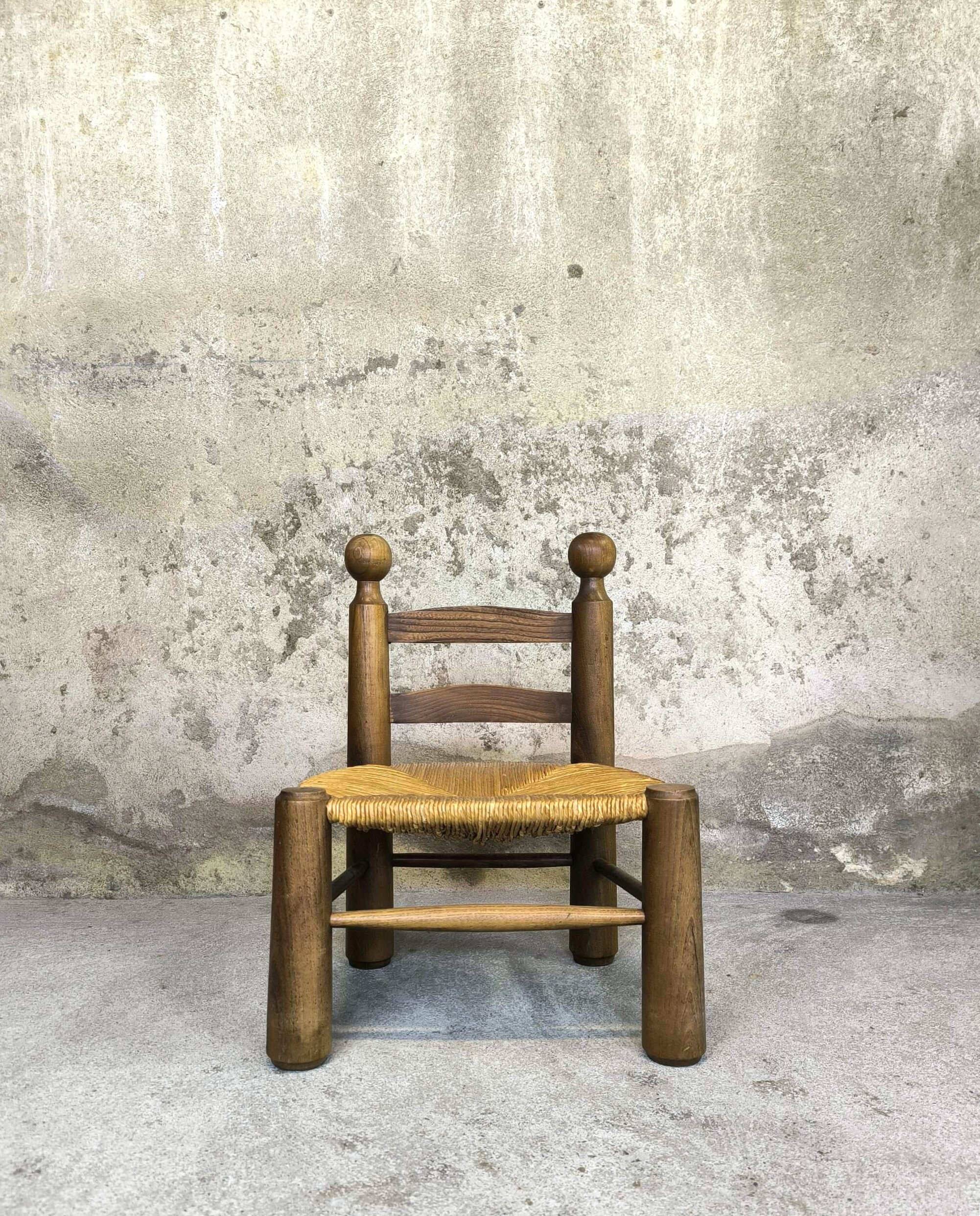 Vintage low chair in wood and straw
