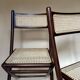 Set de quatre chaises pliantes en bois et cannage