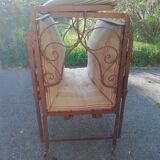 Old wrought iron folding bed