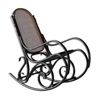 Black rocking chair in curved wood, years 50
