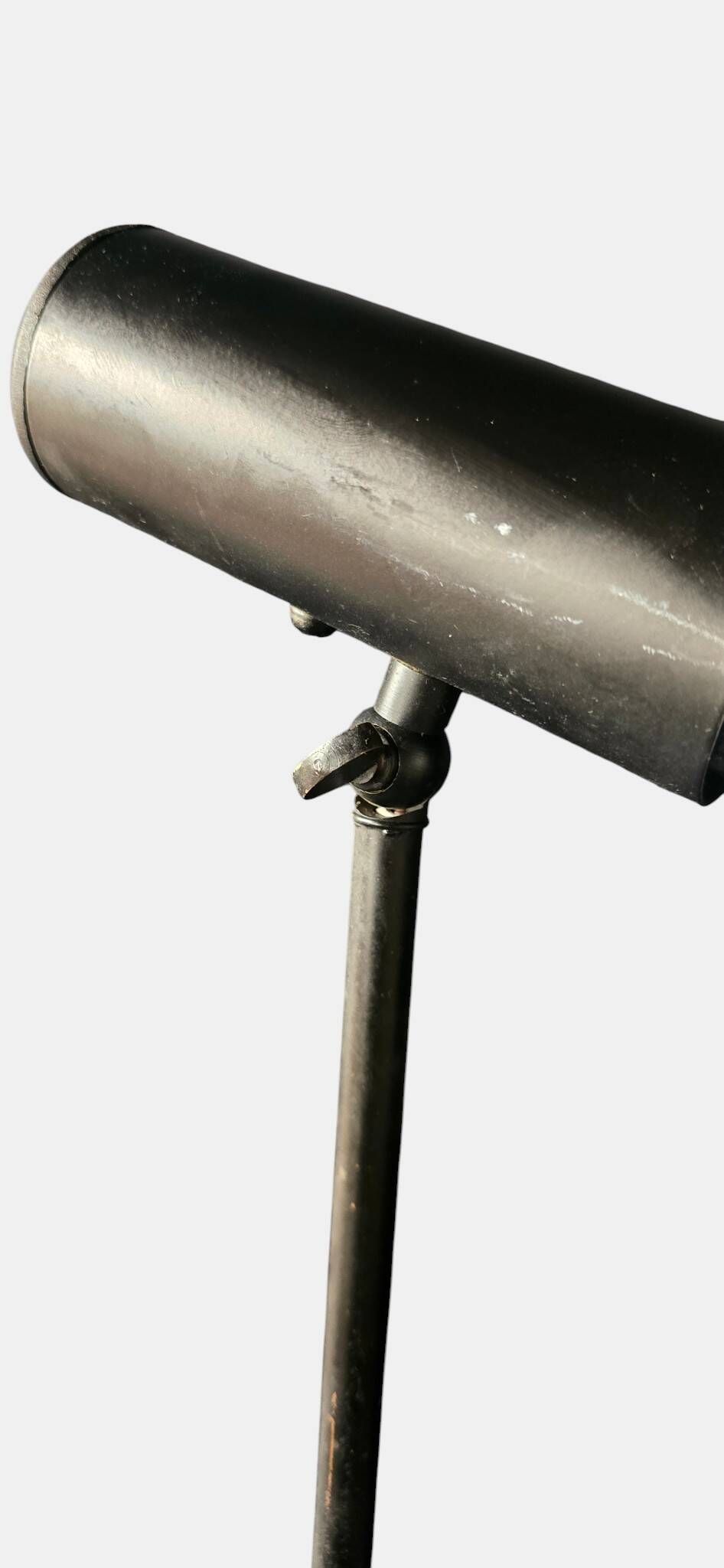 Minimalist metal wall light in the style of Jean Prouvé, circa 1950.