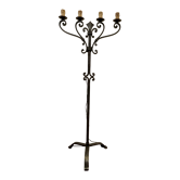 Floor lamp has four wrought iron lights