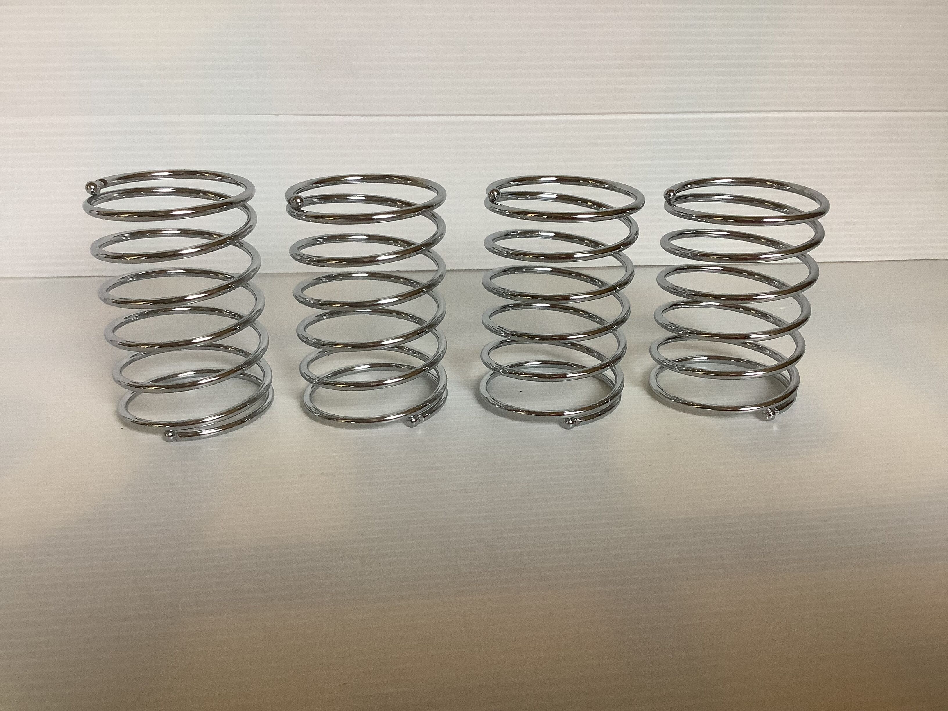 Four shells stainless steel spiral spring