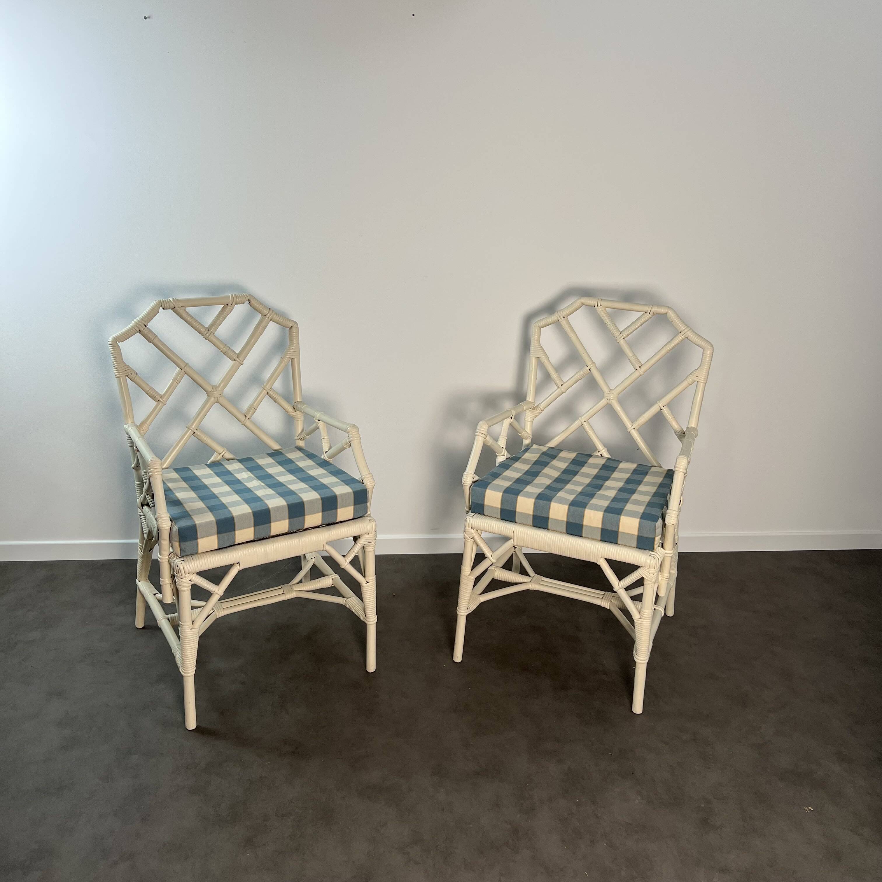 Pair of Angraves armchairs model Invincible in Chinese Chippendale style.