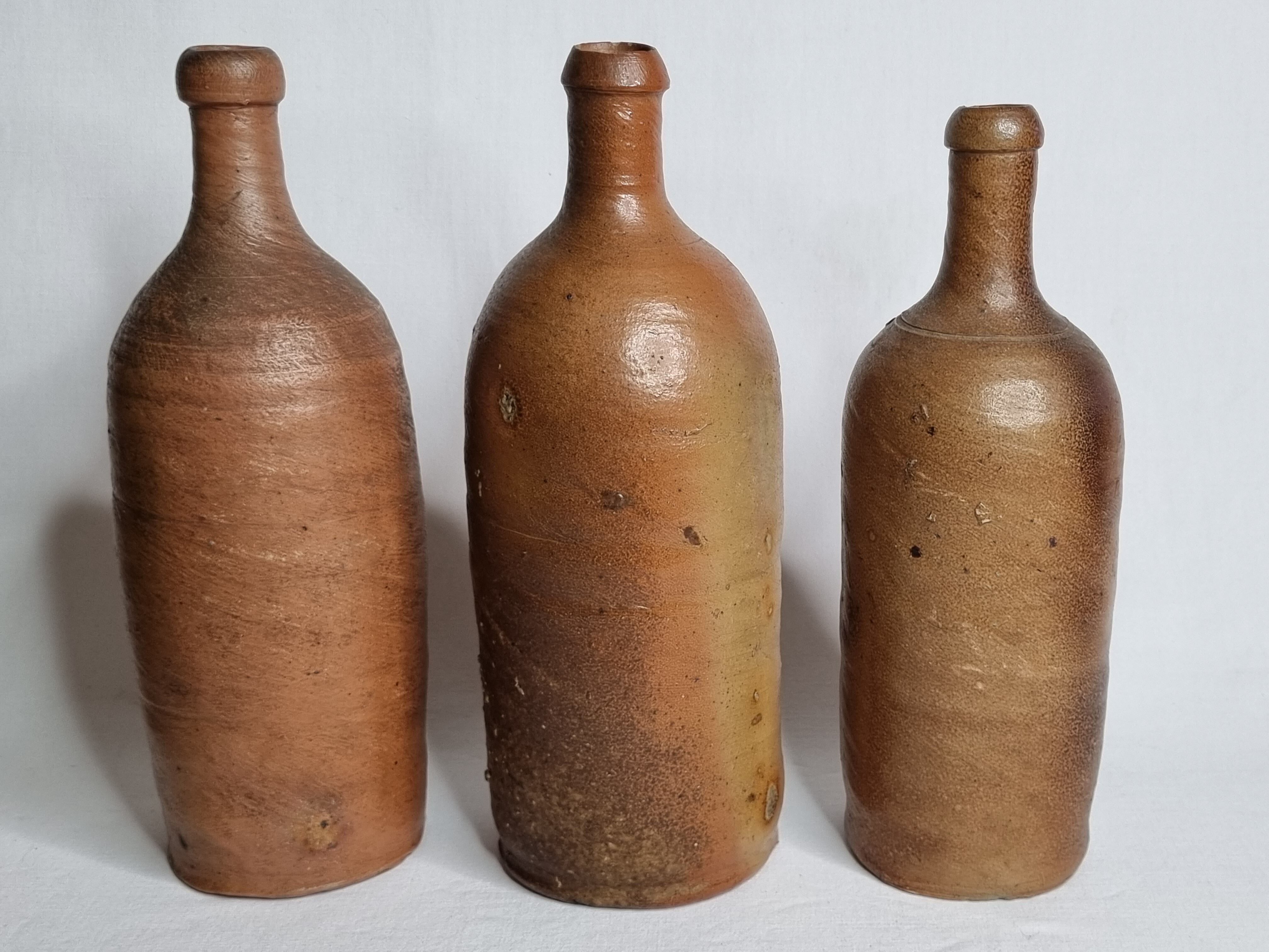 Set of 6 hand-turned stoneware bottles, 31 cm