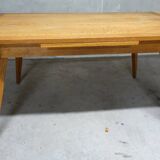 Dining table in blond oak compass feet 1950