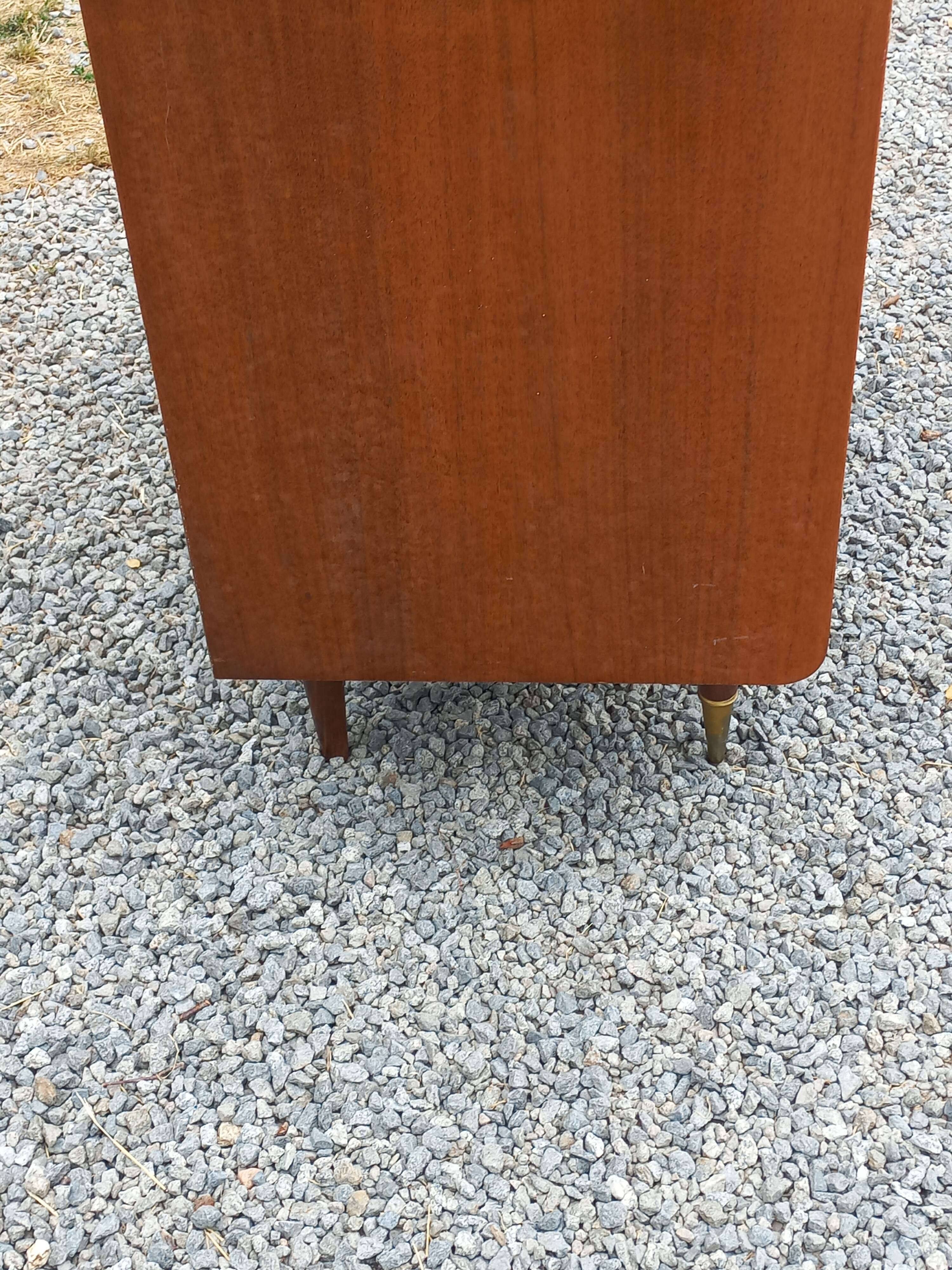 Vintage walnut varnished chest of drawers with 4 drawers from the 1960s.