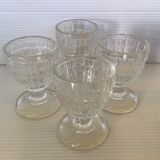 Four old molded glass shells