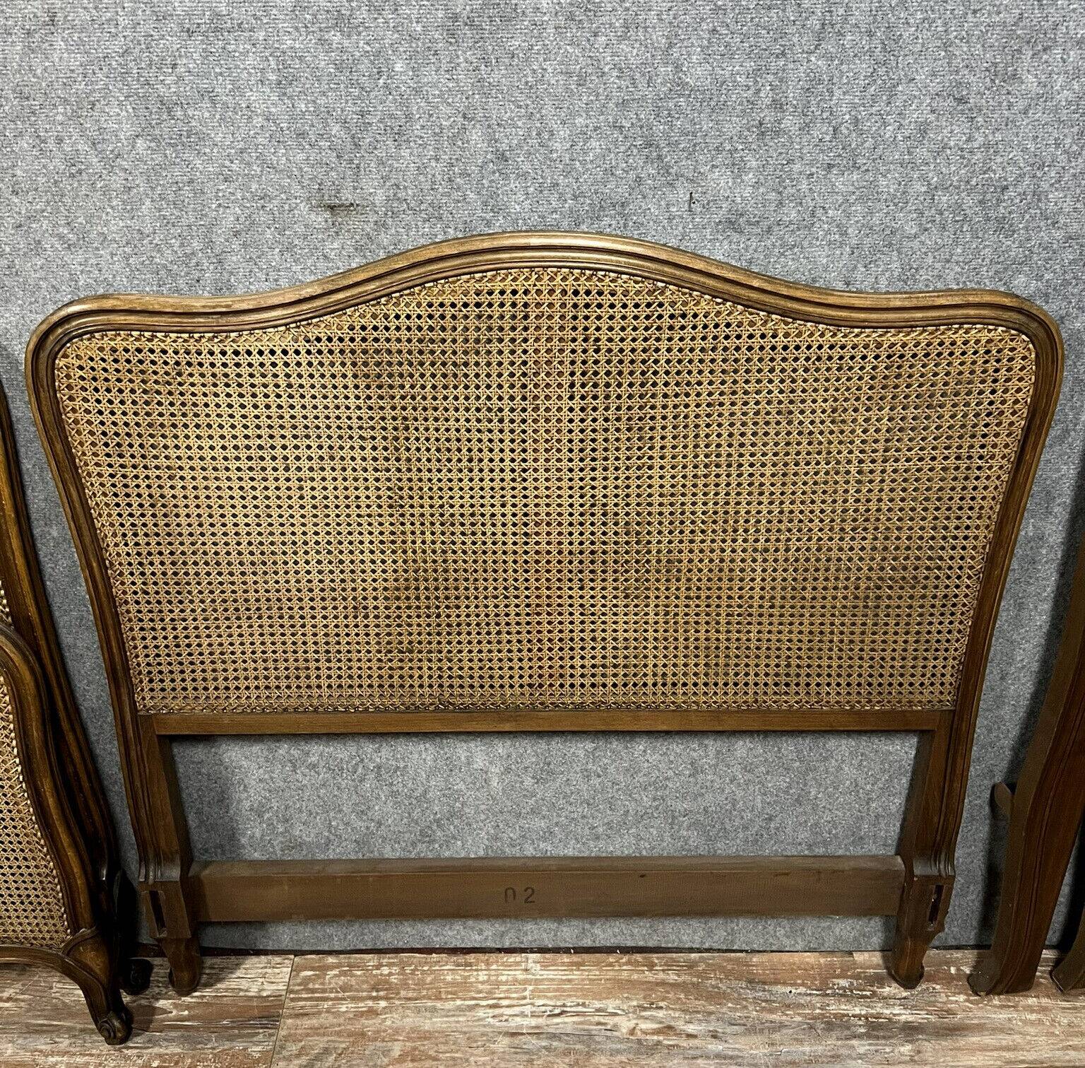 Pair of Louis XV style center beds in walnut and cane base circa 1900