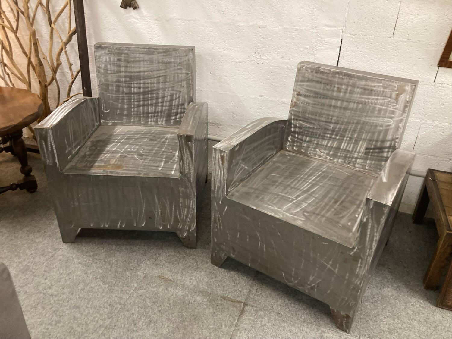 Pair of industrial metal armchairs