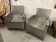 Pair of industrial metal armchairs