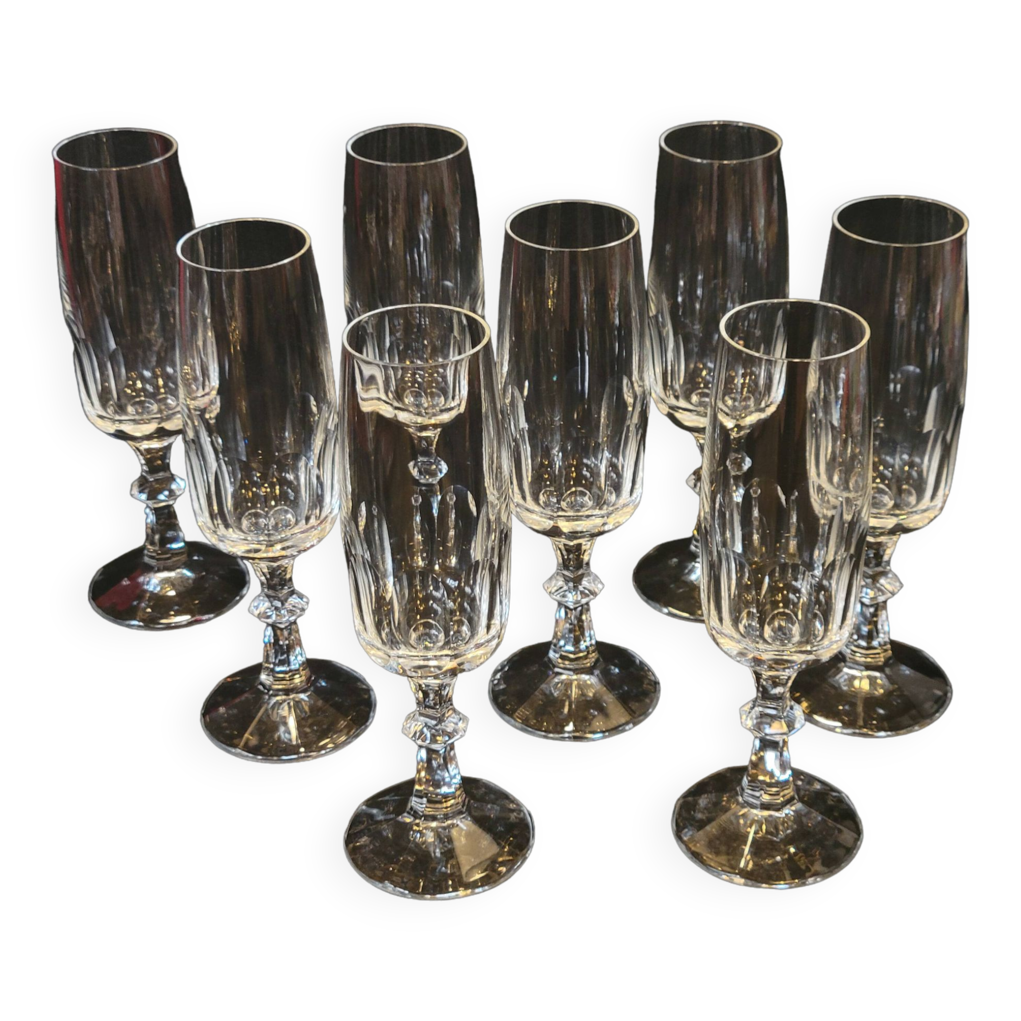 8 champagne flutes in flat cut crystal