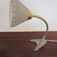 Scandinavian articulated lamp EWÅ for table or wall mounting.