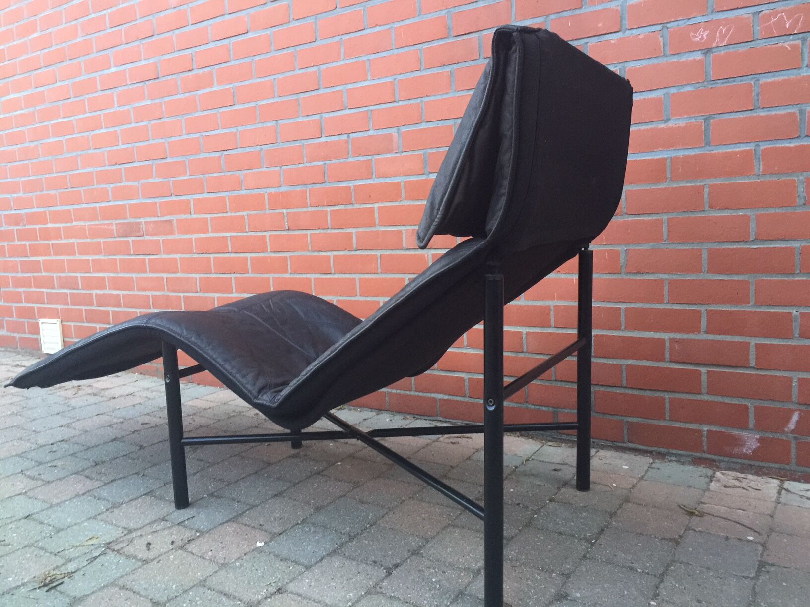 Leather lounge chair  by wrong Björklund  1980 s