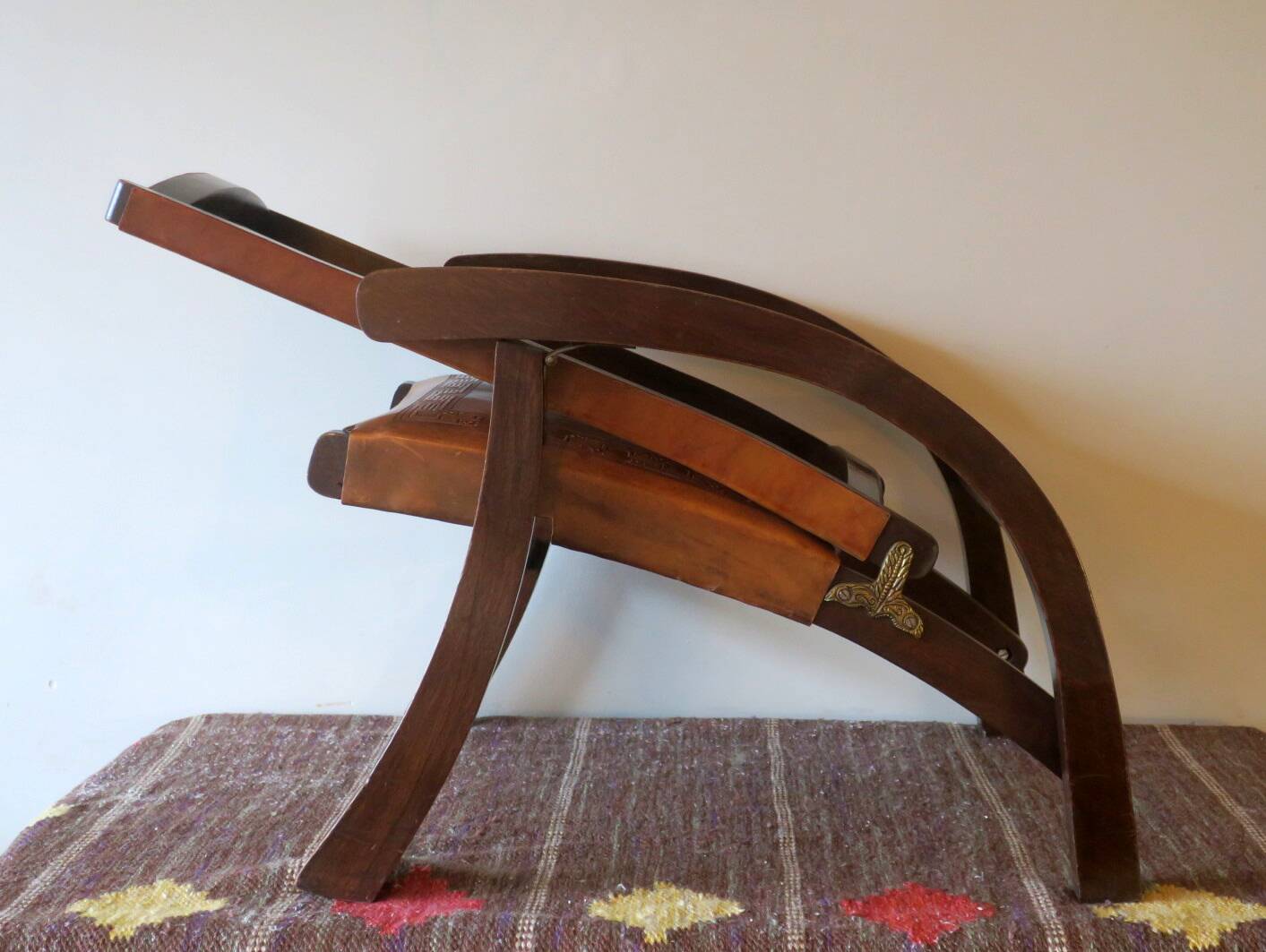 Tiahuanaco design tooled leather folding armchair by Angel Pazmino, Ecuador