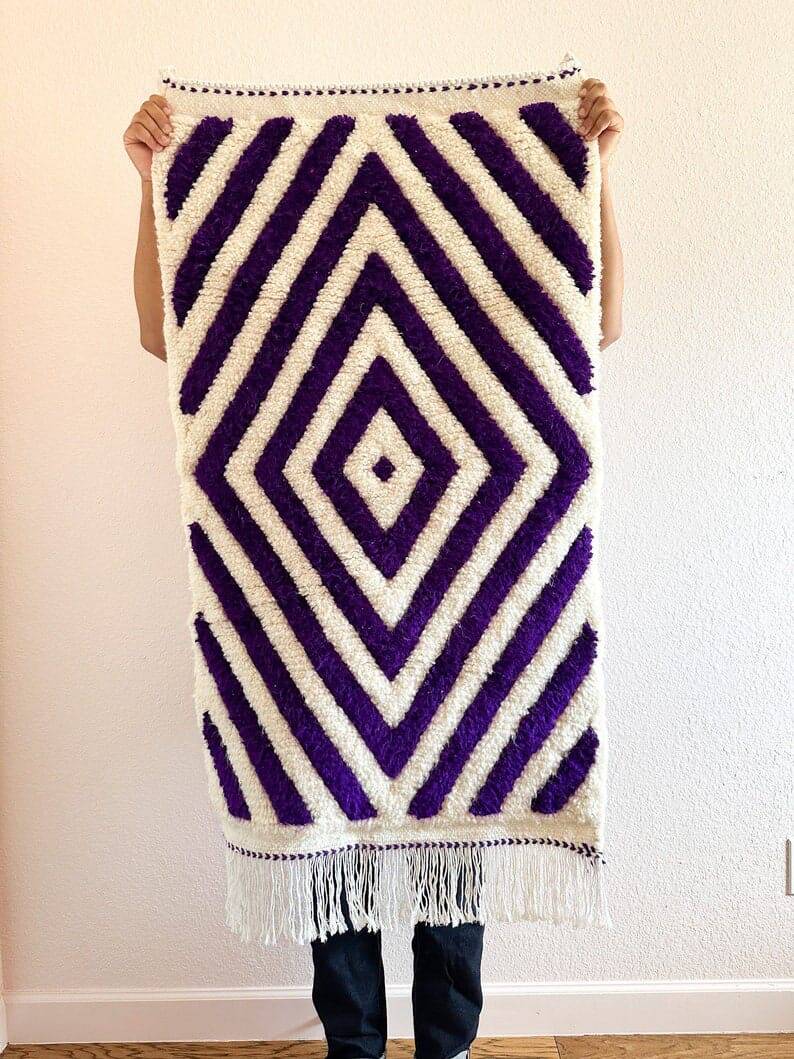 Handmade wool rug from Moroccan Atlas, size 140 x 260 cm.