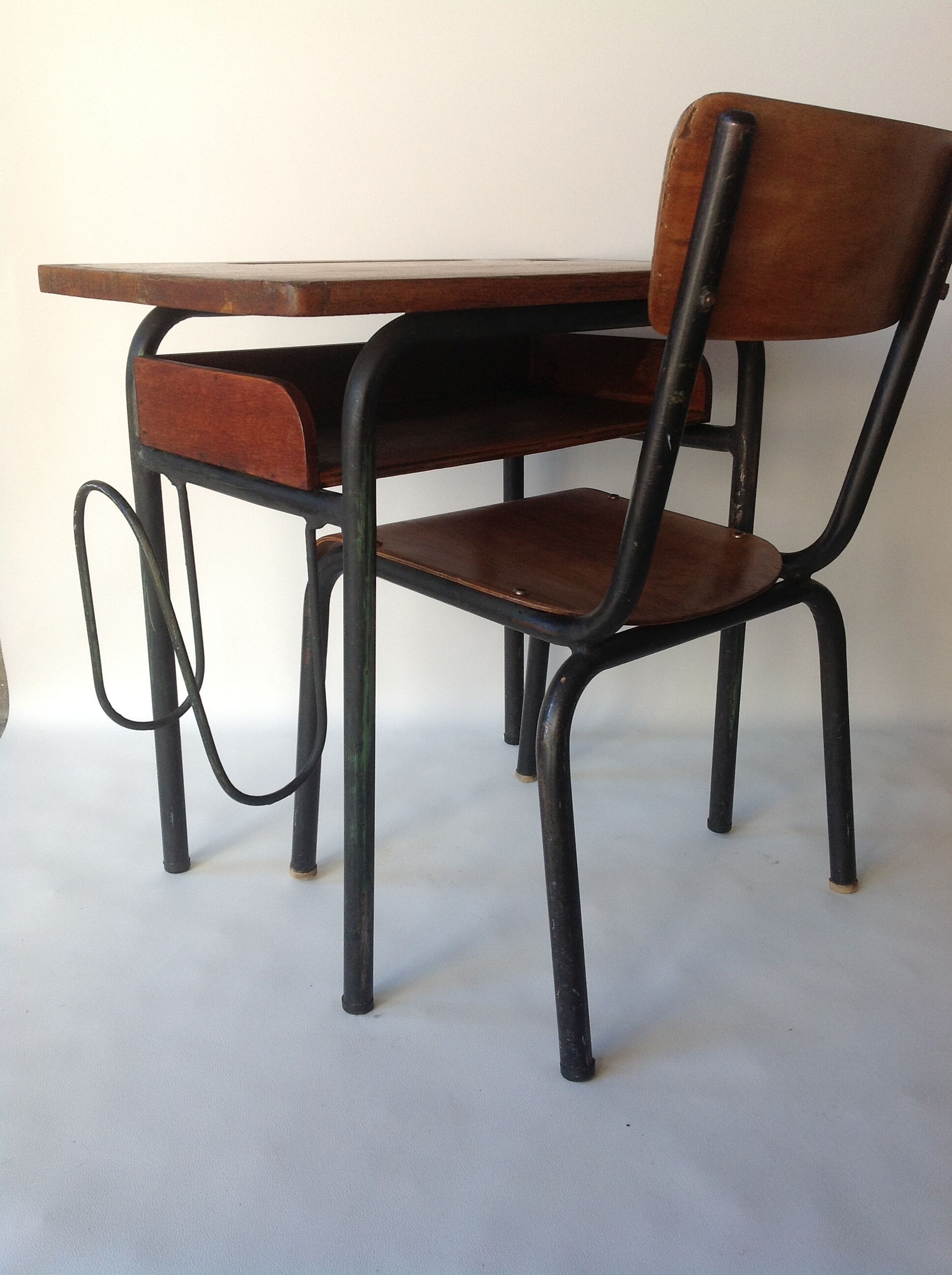 Old wooden school desk and chair