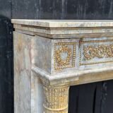 Cheminée de style Louis XVI en marbre jaune de Sienne et bronzes