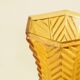 Vintage Art Deco vase in amber yellow cut glass with geometric design.