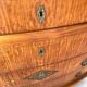 The demi-lune commode/ chest of drawers