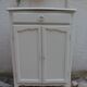 Small buffet, reimagined storage unit in beige.