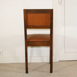 Set of four chairs in wood and leatherette