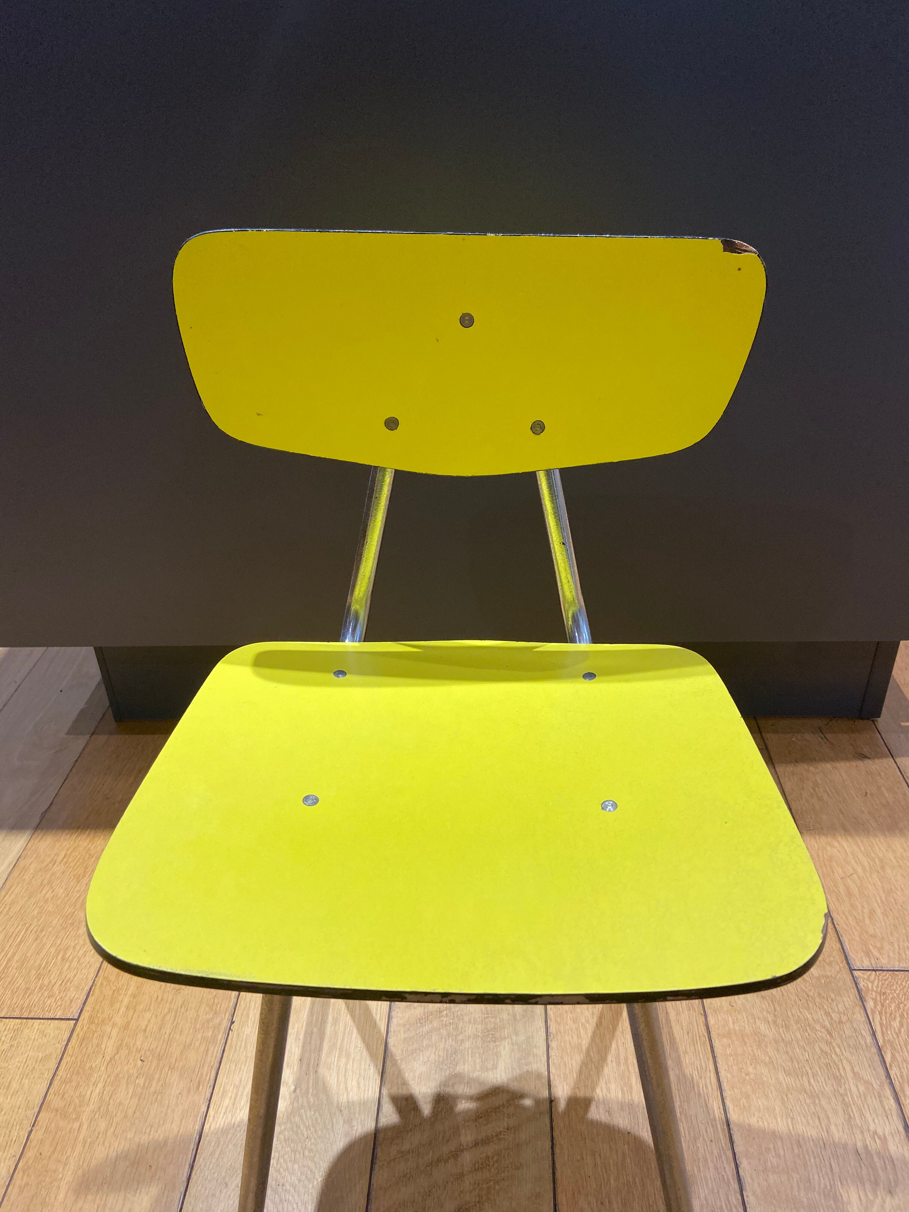 Yellow chair in child formica