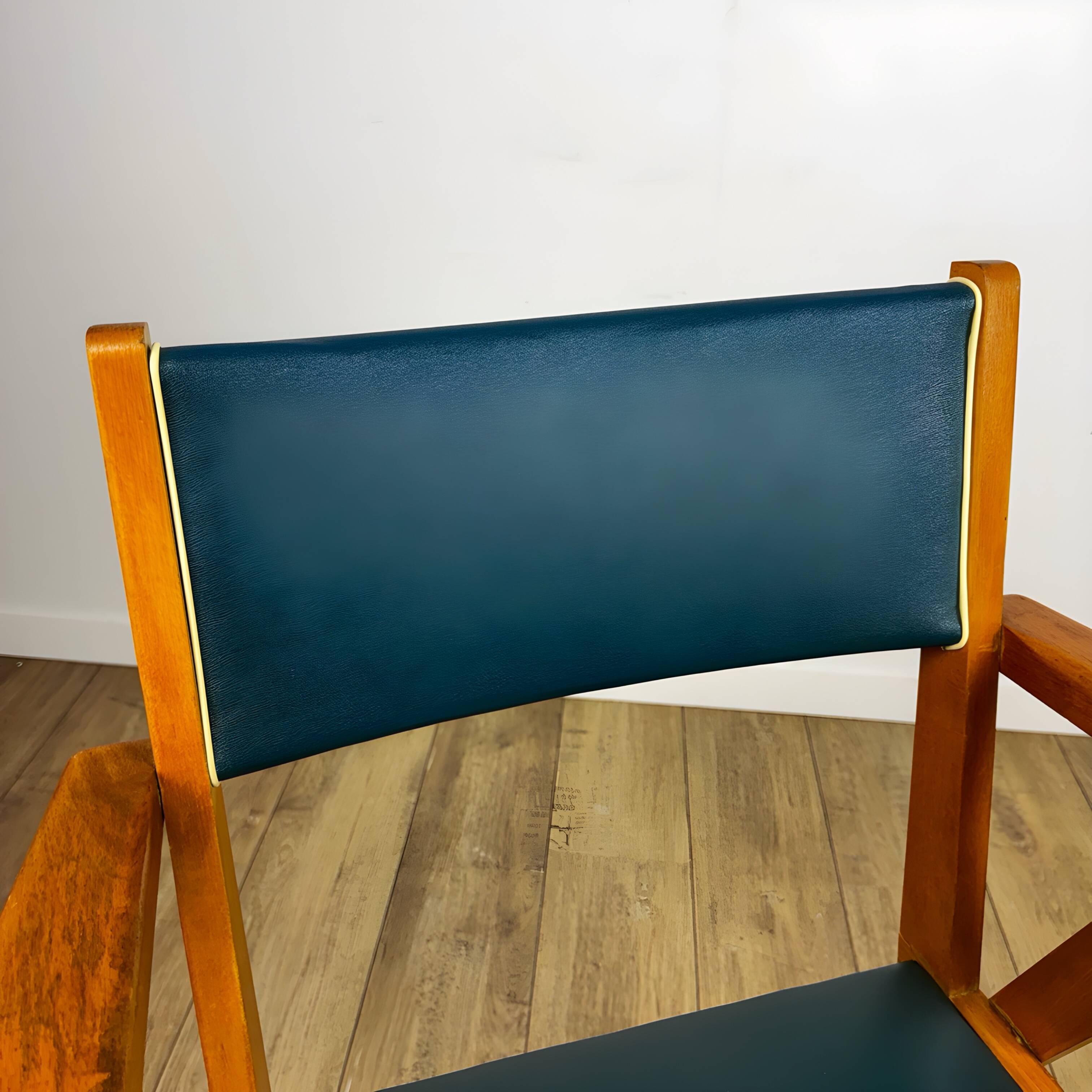 Pair of Scandinavian bridge armchairs in wood and vinyl from the 1950s.