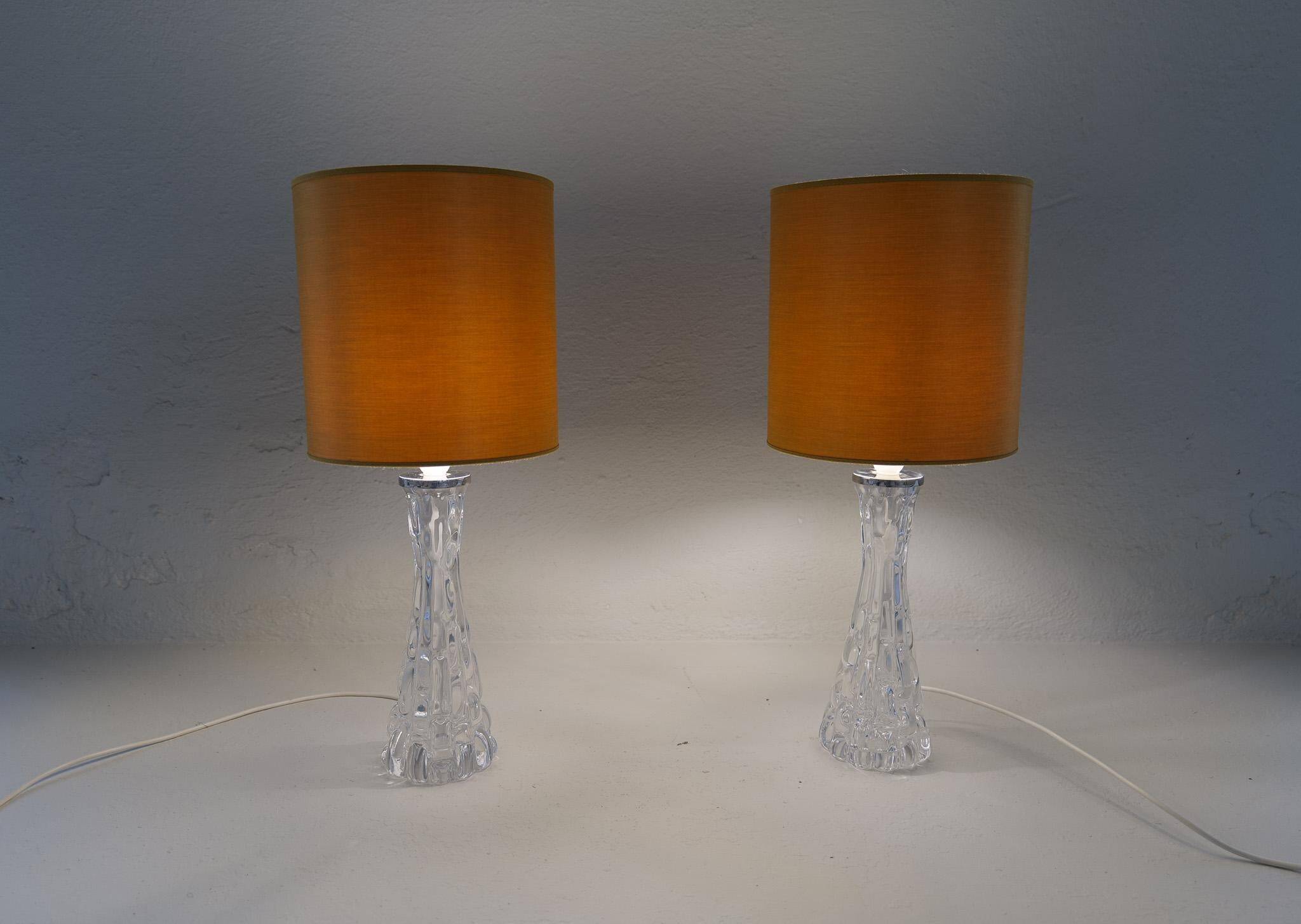Mid-century modern crystal table lamps by Orrefors, designed by Carl Fagerlund, Sweden, 1970s.