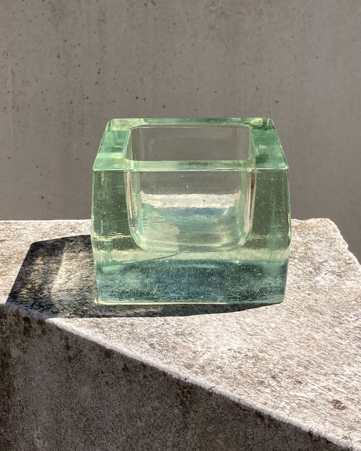 Empty pocket 70s molded glass